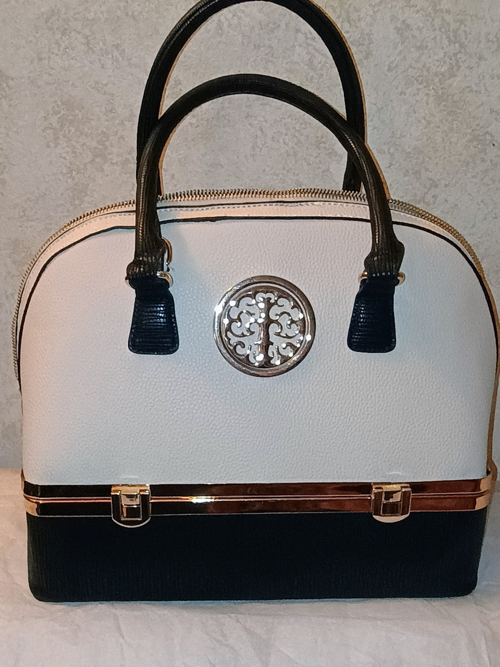 Elegant Two-Tone Black and Cream Dome Satchel
